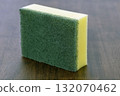 Green scrub sponge cleaning sponge kitchen sponge dish sponge household cleaning scrubber abrasive pad yellow foam porous hygiene 132070462