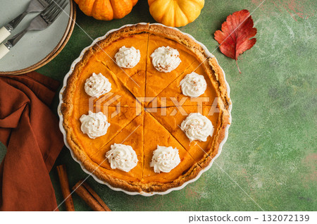 Pumpkin pie, Thanksgiving homemade crust tart, topped with whipped cream 132072139