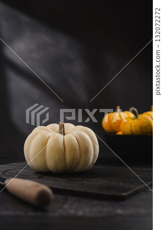 single white small pumkin with black background 132072272