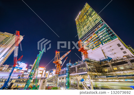 Tokyo cityscape, Japan, October 17th. Huge heavy machinery such as crawler cranes and pile drivers are lined up... = Shibuya Tokyo cityscape, Japan, October 17th. Huge heavy machinery such as crawler cranes and pile drivers are lined up... = Shibuya 132073692