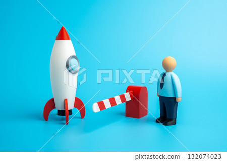 A construction worker and a rocket behind a barrier gate. Not being invited to a project or startup. Missed opportunities, career limits, and innovation access issues. Competition in technology 132074023