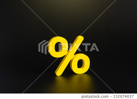 Yellow percentage symbol on a dark background. Financial services, loans, and deposits. Symbol of interest rates, sales, and discounts. Finance, banking, and retail promotions. 132074037