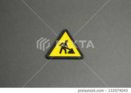 Construction work symbol. Repair, renovation, and reconstruction. Concept of urban development, infrastructure upgrade, and time limits. Engineering and municipal service Construction work symbol. Repair, renovation, and reconstruction. Concept of urban development, infrastructure upgrade, and time limits. Engineering and municipal service 132074043