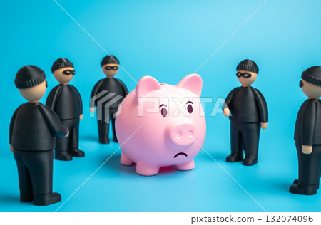 Robbers want to steal savings. Savings are at risk. Symbol of financial threat, fraud, and data theft. Banking, insurance, and cybersecurity 132074096