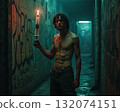 Model posing in an urban alley with a candle in hand during nighttime exploration in a gritty environment 132074151