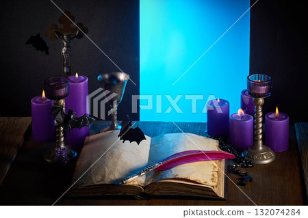 Dracula room decoration for Halloween, Dark decor with wooden table and burning candles Dracula room decoration for Halloween, Dark decor with wooden table and burning candles 132074284