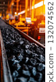 Closeup of coal stones on automated conveyor line in industrial mining plant 132074562