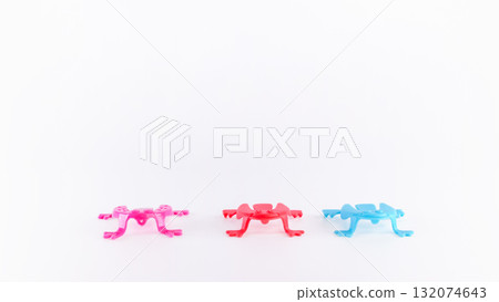Colorful plastic frogs in pink, red, and blue arranged on a white background, showcasing playful design and vibrant hues for creative projects Colorful plastic frogs in pink, red, and blue arranged on a white background, showcasing playful design and vibrant hues for creative projects 132074643