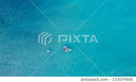 Fishing boat on the turquoise sea Fishing boat on the turquoise sea 132074900