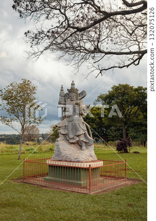 Intricate carving of a Chinese warrior figure at the Templo Budista Chen Tien. Foz do Iguacu, Parana, Brazil 132075126