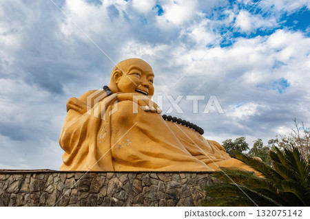 Maitreya Buddha (Laughing Buddha) statue, radiating joy and prosperity at Chen Tien Buddhist Temple. Foz do Iguacu, Brazil. 132075142