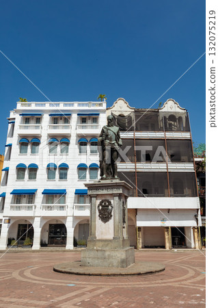 Historic square in Cartagena de Indias featuring the statue of Pedro de Heredia and surrounding traditional architecture. Historic square in Cartagena de Indias featuring the statue of Pedro de Heredia and surrounding traditional architecture. 132075219