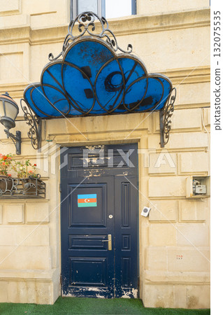 the Azerbaijani flag on the front door in Baku, Azerbaijan the Azerbaijani flag on the front door in Baku, Azerbaijan 132075535