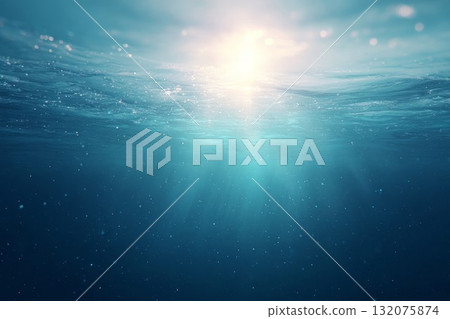 Ocean scene shines with sunlight, featuring light rays diving into blue depths. Suitable for travel and marine art. Ocean scene shines with sunlight, featuring light rays diving into blue depths. Suitable for travel and marine art. 132075874