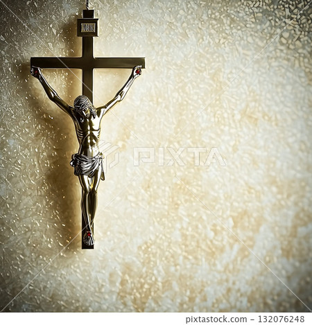 Gold cross with a man holding it up, with the letters W and N on it 132076248