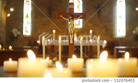 Lit candle in front of a cross with the number 3 on it 132076403