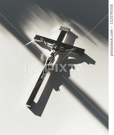 Cross with a statue of Jesus Christ on it 132076508