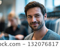 Smiling man in casual attire shopping in modern clothing store environment 132076817