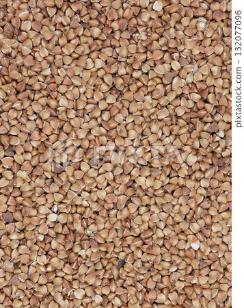 A close-up view of buckwheat. The textured abstract background 132077096