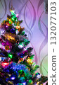 Brightly decorated Christmas tree with colorful lights and ornaments indoors. Festive holiday atmosphere and New Year mood 132077103