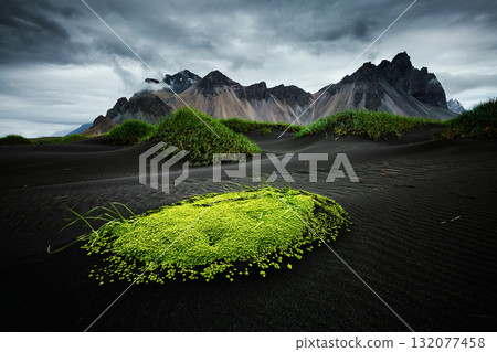 ocation famous place Stokksnes cape, Vestrahorn (Batman Mountain), Iceland, Europe. 132077458