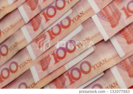 number 100 on Chinese yuan, Chinese red money folded together, a large amount of money is the Chinese national currency 132077883