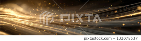 Elegant abstract background featuring golden glowing lines and sparkling bokeh particles moving in a dynamic, wavy flow against a dark backdrop. Ideal for luxury, technology, and celebration themes Elegant abstract background featuring golden glowing lines and sparkling bokeh particles moving in a dynamic, wavy flow against a dark backdrop. Ideal for luxury, technology, and celebration themes 132078537