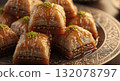 Extreme close-up of a piece of golden Baklava, a traditional Middle Eastern or Mediterranean dessert 132078797