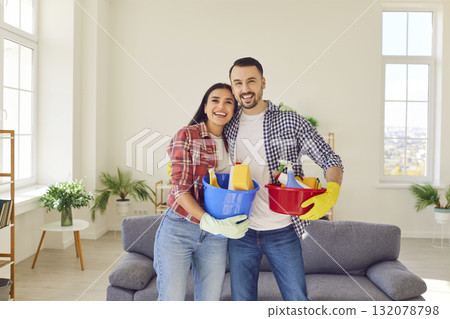 Happy Couple Embracing Housework Together Happy Couple Embracing Housework Together 132078798