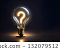 Illuminated Lightbulb with Glowing Question Mark Symbolizing Innovation and Curiosity 132079512