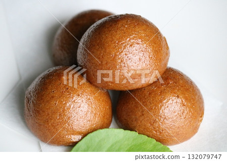 Fluffy steamed buns, tea time, green leaves Fluffy steamed buns, tea time, green leaves 132079747