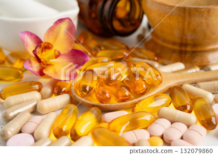 Alternative medicine herbal organic capsule with vitamin E omega 3 fish oil, mineral, drug with herbs leaf natural supplements for healthy good life. 132079860