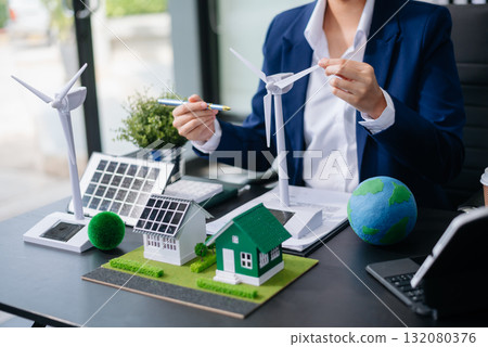 Business planning hand using laptop for working technology and business Net zero and carbon neutral concept.NET ZERO Business planning hand using laptop for working technology and business Net zero and carbon neutral concept.NET ZERO 132080376