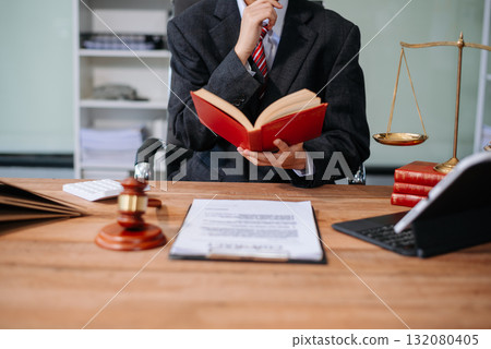 Justice and law concept.Male judge in a courtroom on white table and Counselor Justice and law concept.Male judge in a courtroom on white table and Counselor 132080405
