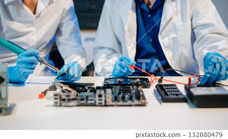 Electronics technician, electronic engineering electronic repair, electronics measuring and testing, repair and maintenance concepts. Electronics technician, electronic engineering electronic repair, electronics measuring and testing, repair and maintenance concepts. 132080479