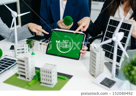 business team people planning and discussing on recycle reduce reuse policy symbol in office meeting room. business team people planning and discussing on recycle reduce reuse policy symbol in office meeting room. 132080492