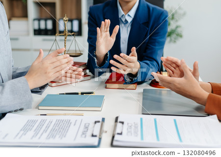 Asian team and lawyers discussing contract papers coworker, teamwork celebrating achievement.Concepts Asian team and lawyers discussing contract papers coworker, teamwork celebrating achievement.Concepts 132080496