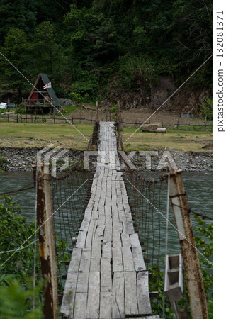 Wooden suspension bridge over the Chorukh River Wooden suspension bridge over the Chorukh River 132081371