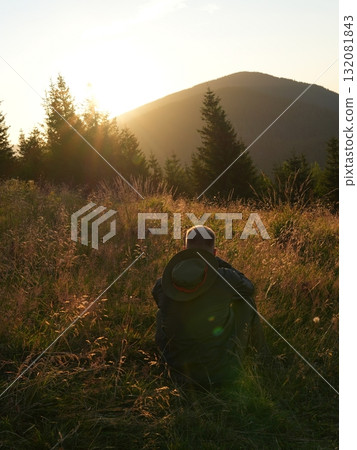 Beautiful mountain landscape, light over peaks and valleys, natural scenery, calm atmosphere and wild nature 132081843