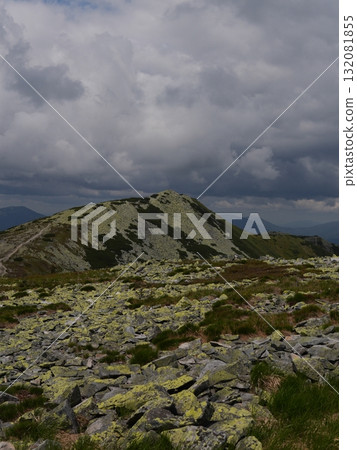 Beautiful mountain landscape, light over peaks and valleys, natural scenery, calm atmosphere and wild nature 132081855
