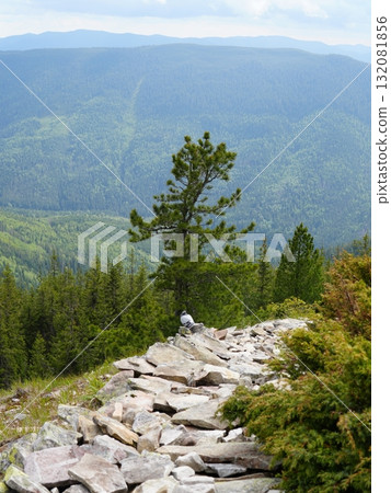 Beautiful mountain landscape, light over peaks and valleys, natural scenery, calm atmosphere and wild nature Beautiful mountain landscape, light over peaks and valleys, natural scenery, calm atmosphere and wild nature 132081856