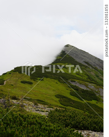 Beautiful mountain landscape, light over peaks and valleys, natural scenery, calm atmosphere and wild nature Beautiful mountain landscape, light over peaks and valleys, natural scenery, calm atmosphere and wild nature 132081858