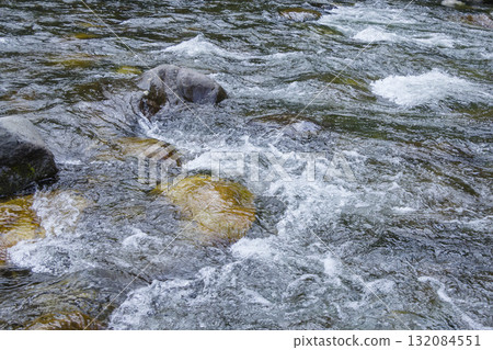 A landscape with a clear flowing river in Wakasa Town, Tottori Prefecture 132084551