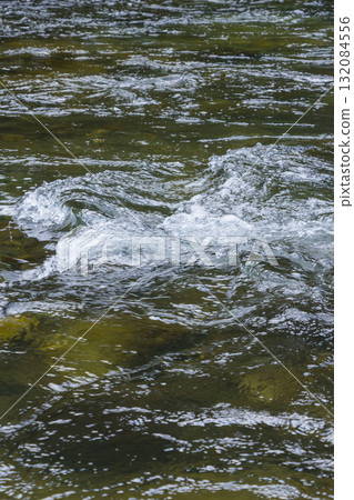 A landscape with a clear flowing river in Wakasa Town, Tottori Prefecture 132084556
