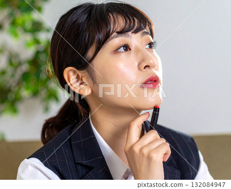 Young woman thinking an idea 132084947