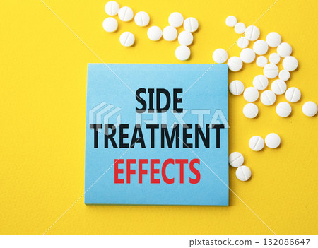 Side Treatment Effects symbol. Concept words Side Treatment Effects on blue note. Beautiful yellow background with pills. Healthcare and Side Treatment Effects concept. Copy space. Side Treatment Effects symbol. Concept words Side Treatment Effects on blue note. Beautiful yellow background with pills. Healthcare and Side Treatment Effects concept. Copy space. 132086647