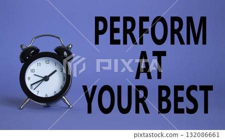 Perform at your best symbol. Beautiful purple background with alarm clock. Business and Perform at your best concept. Copy space. Perform at your best symbol. Beautiful purple background with alarm clock. Business and Perform at your best concept. Copy space. 132086661