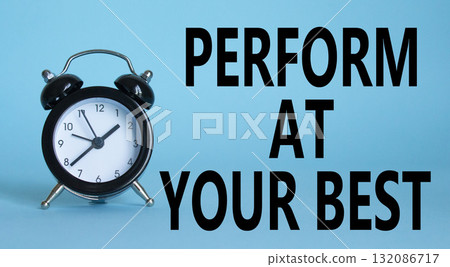 Perform at your best symbol. Beautiful blue background with alarm clock. Business and Perform at your best concept. Copy space. Perform at your best symbol. Beautiful blue background with alarm clock. Business and Perform at your best concept. Copy space. 132086717