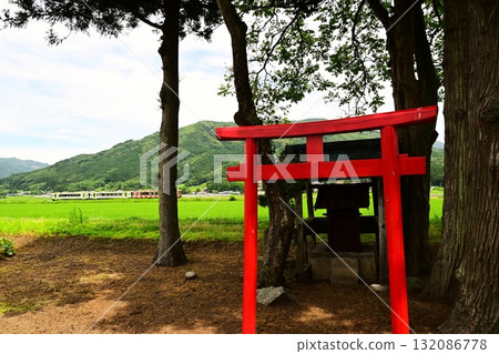 Tono in summer: Kamaishi Line and a small shrine Tono in summer: Kamaishi Line and a small shrine 132086778