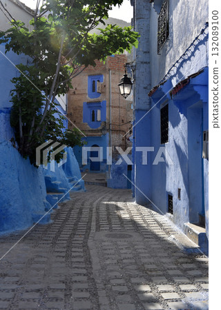 Chefchaouen, Morocco. Houses, streets and steps of old medina painted in blue Chefchaouen, Morocco. Houses, streets and steps of old medina painted in blue 132089100